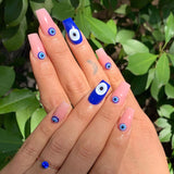Glittery Blue Evil Eye Nail Art