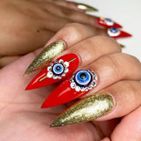 Glittery Blue Evil Eye Nail Art